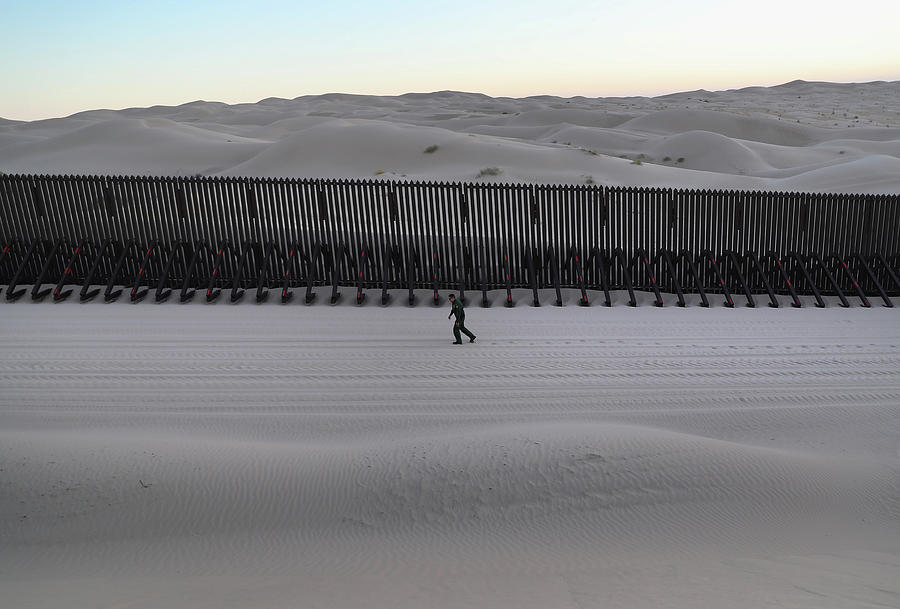 Border Patrol Agents Monitor Fence On Photograph by John Moore