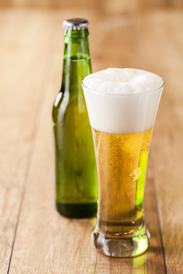 Beer Photograph - Bottle And Glass With Beer  by Daniel Barbalata