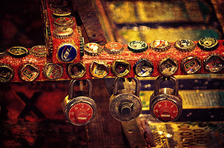 Bottle Caps And Locks Photograph by Maria Angelica Maira