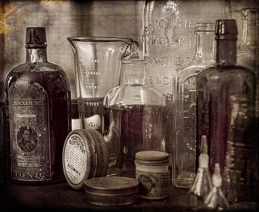 Bottles and Tins Photograph by Wayne Meyer