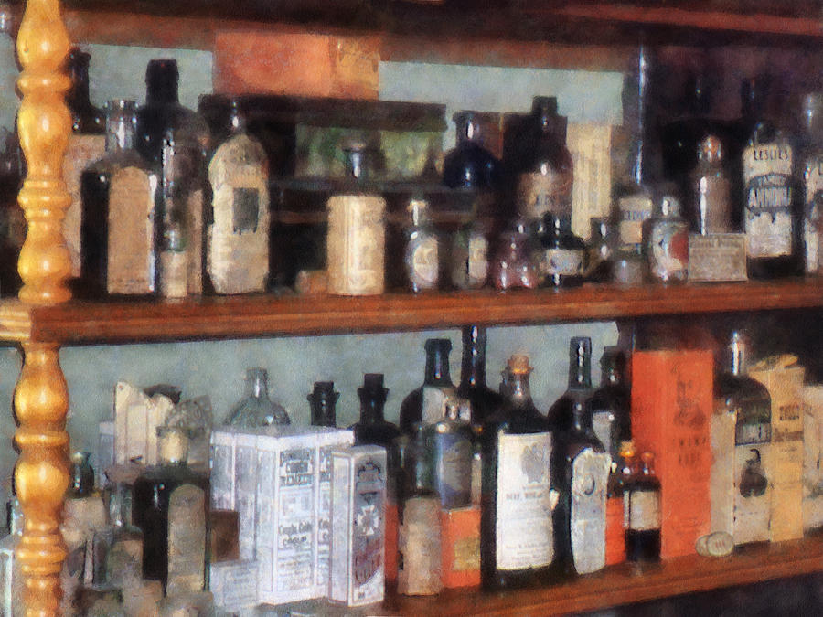 Bottles in General Store Photograph by Susan Savad