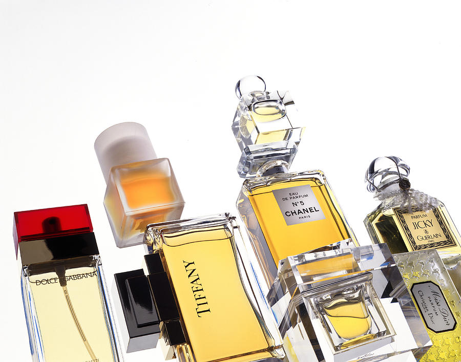 Bottles Of Perfume Photograph by Pidjoe