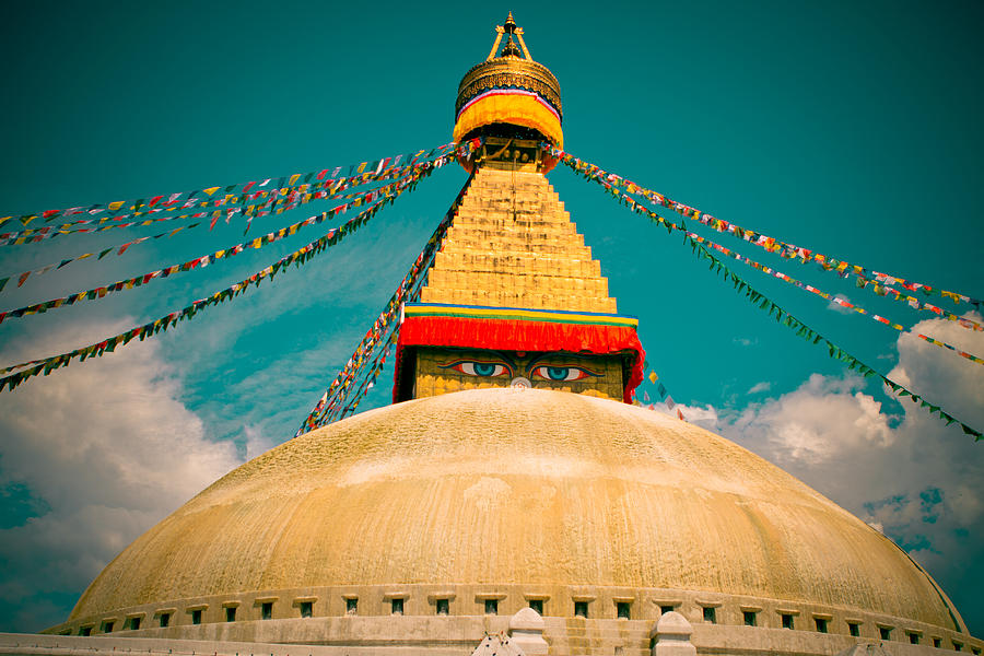 Boudhanath Stupa in Nepal with blue sky Photograph by Raimond Klavins