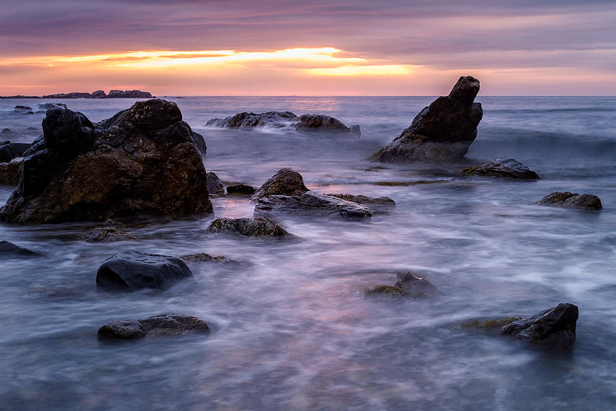 Boulders In The Surf Photograph by Jeff Sinon