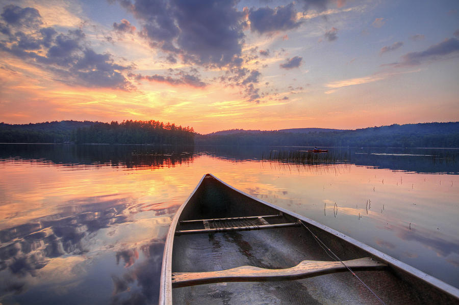 Bow Of Canoe On Lake At Sunset Photograph by Matt Champlin