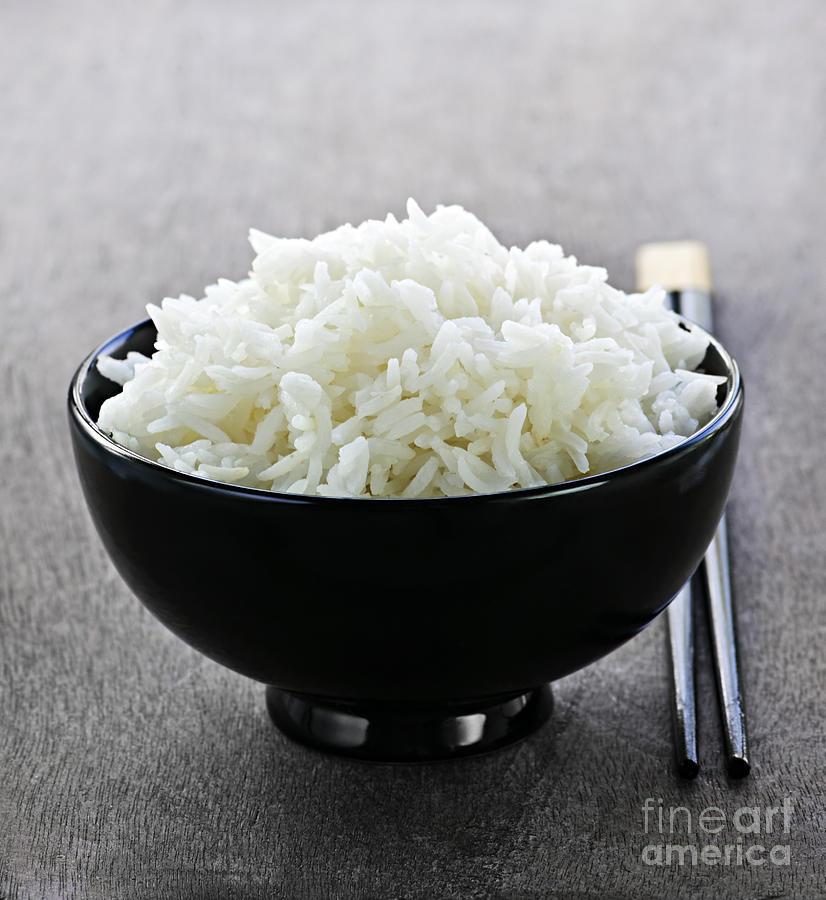 Bowl of rice with chopsticks Photograph by Elena Elisseeva