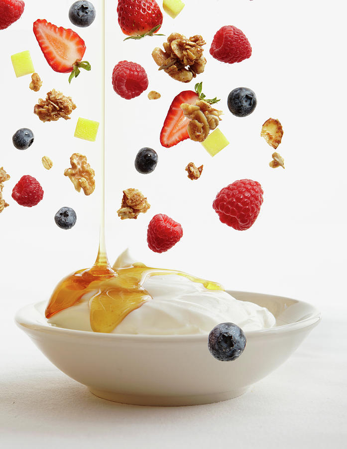 Bowl Of Yogurt With Honey, Fruit, And Photograph by Maren Caruso
