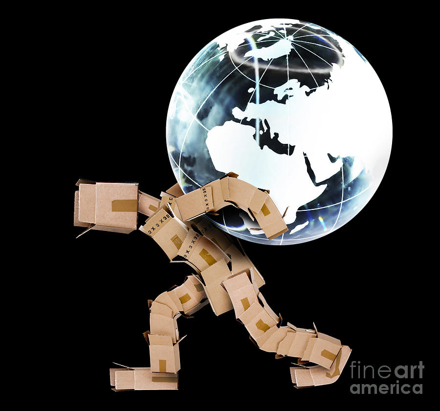 Box character carrying a globe Photograph by Simon Bratt