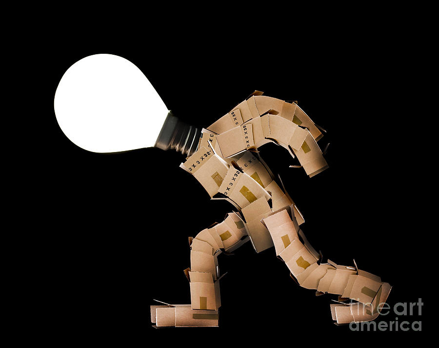 Box character with light bulb head Photograph by Simon Bratt