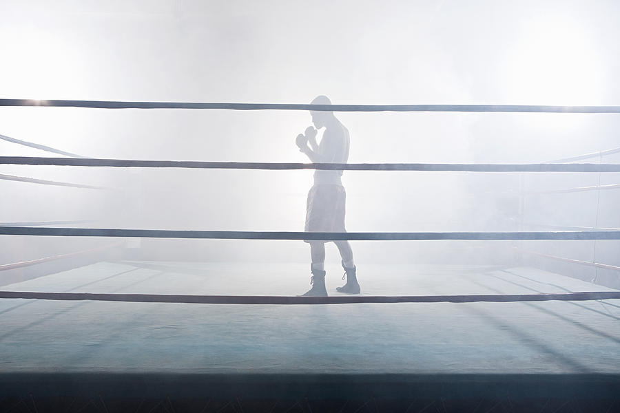 Boxer in boxing ring Photograph by Image Source