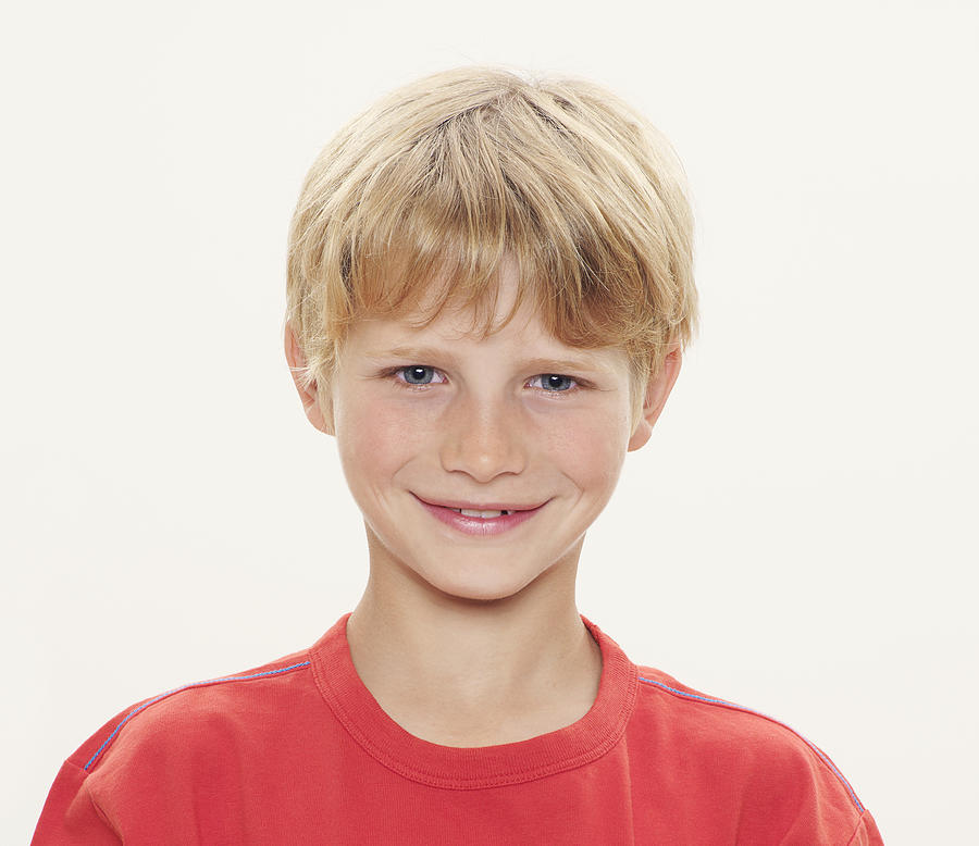 Boy (8-10) smiling, portrait Photograph by Oppenheim Bernhard