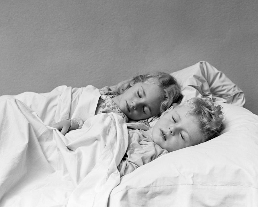 Boy And Girl Asleep In Bed, C.1940s Photograph by H. Armstrong Roberts/ClassicStock