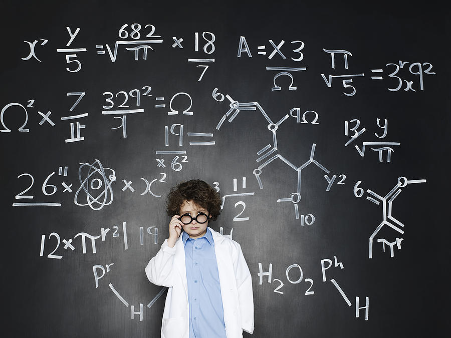 Boy as a professor with formulas behind him Photograph by Flashpop