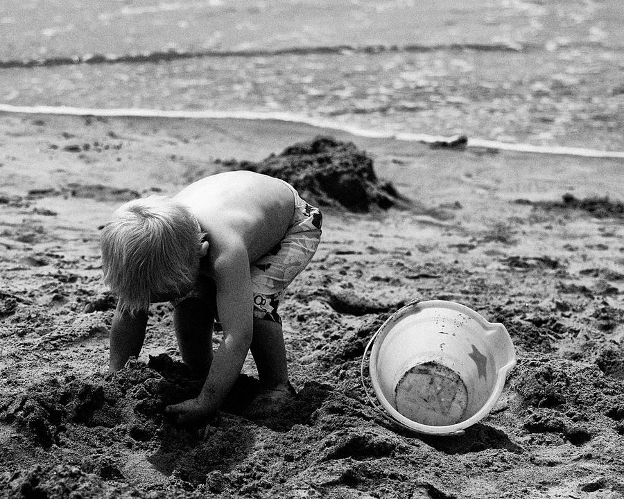 Boy At Beach Photograph