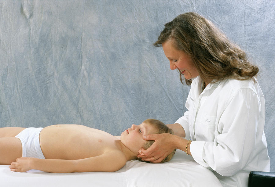 Boy Being Massaged Photograph by Mauro Fermariello/science Photo Library