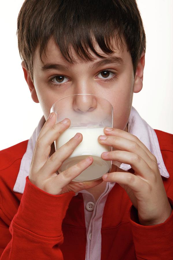 Boy Drinking Milk Photograph by Mauro Fermariello/science Photo Library