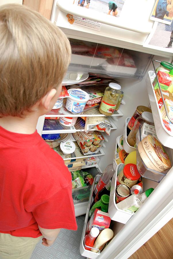 Snack Photograph - Boy Looking In Fridge by Aj Photo/science Photo Library