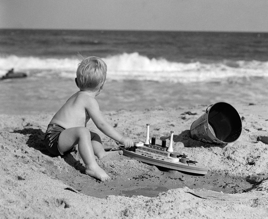 Boy Playing At The Beach, C.1950s Photograph by H Armstrong Roberts and ClassicStock