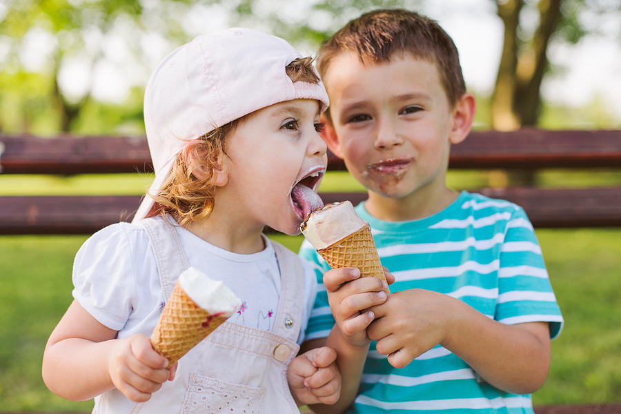Boy Share Ice Cream With His Sister Photograph by CokaPoka