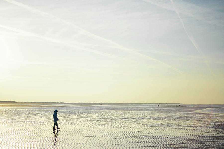 Boy Walking On Beach Photograph by Kirstin Mckee