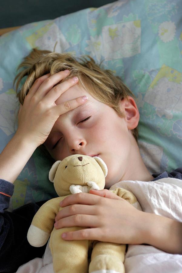 Boy With A Fever Photograph by Claire Deprez/reporters/science Photo Library
