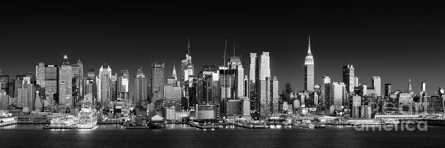 Skyscraper Photograph - West Side skyline panorama at night, New York by Justin Foulkes