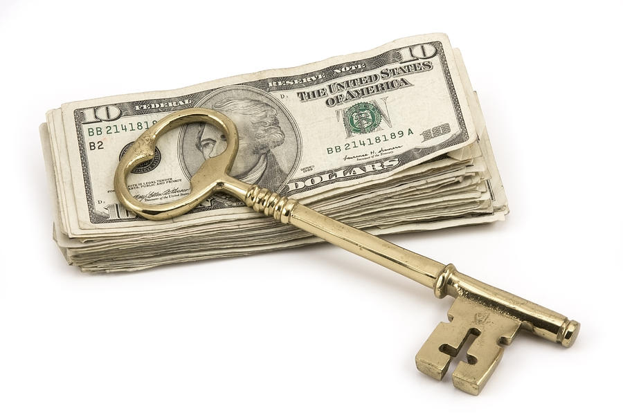 Brass Key To Success On Pile Of American Money  Photograph by Keith Webber Jr