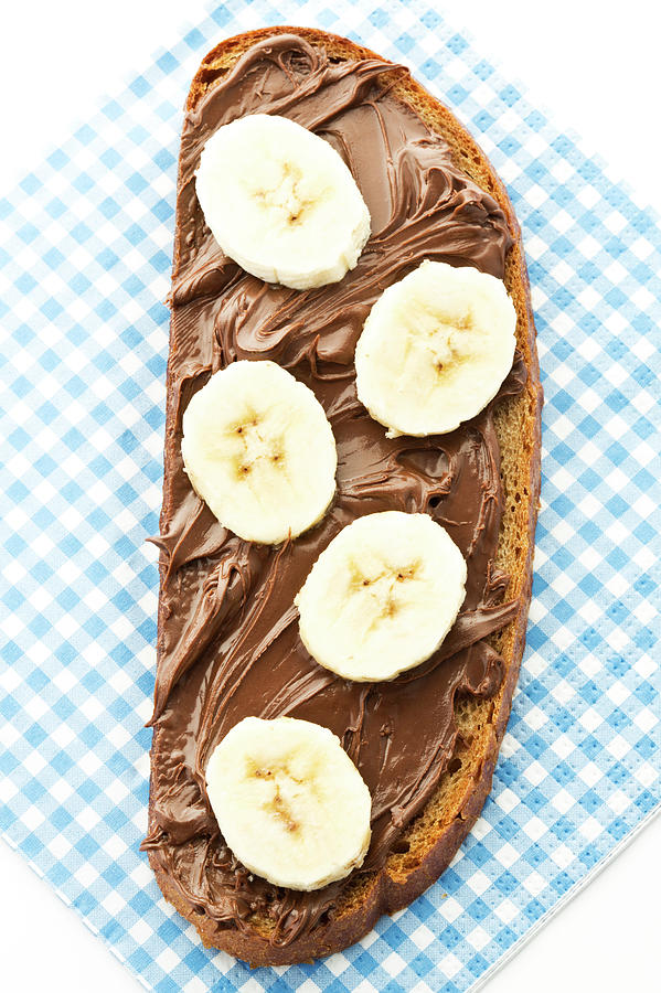Bread Topped With Nutella And Banana Photograph by Westend61