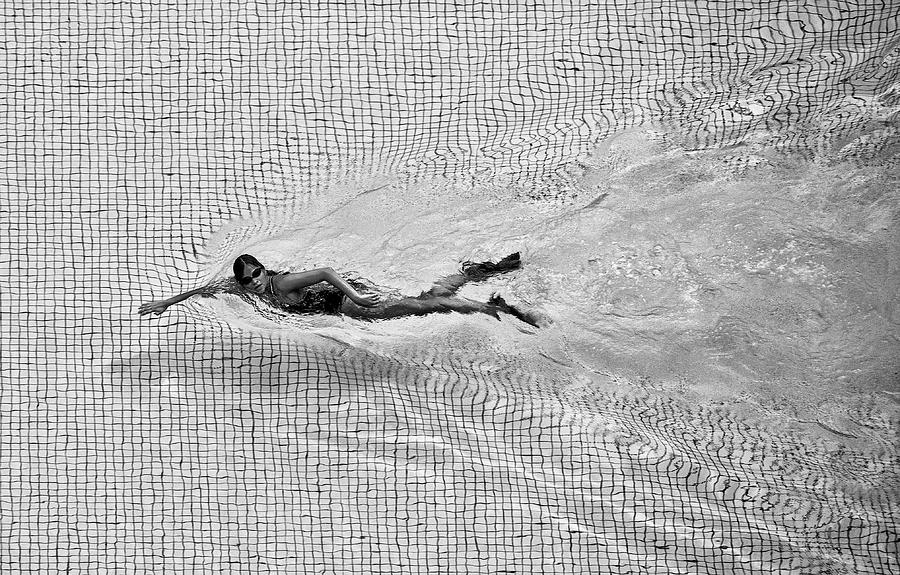 Black And White Photograph - Breaking The Net by C.s. Tjandra