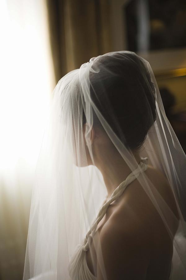 Bride looking away Photograph by Elisa Cicinelli