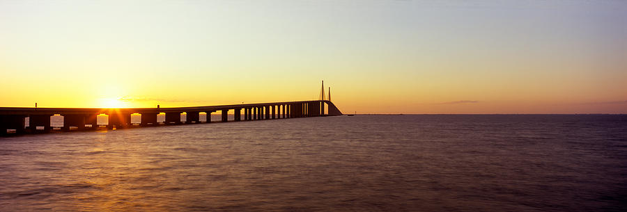 Architecture Photograph - Bridge At Sunrise, Sunshine Skyway by Panoramic Images