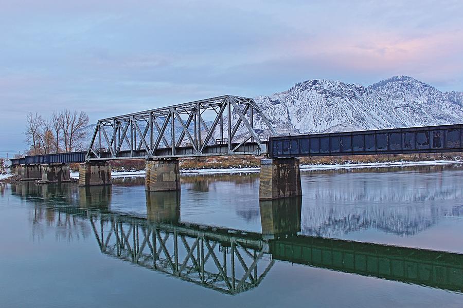 Landscape Photograph - Bridge Over Tranquil Waters in Kamloops British Columbia by Steve Boyko