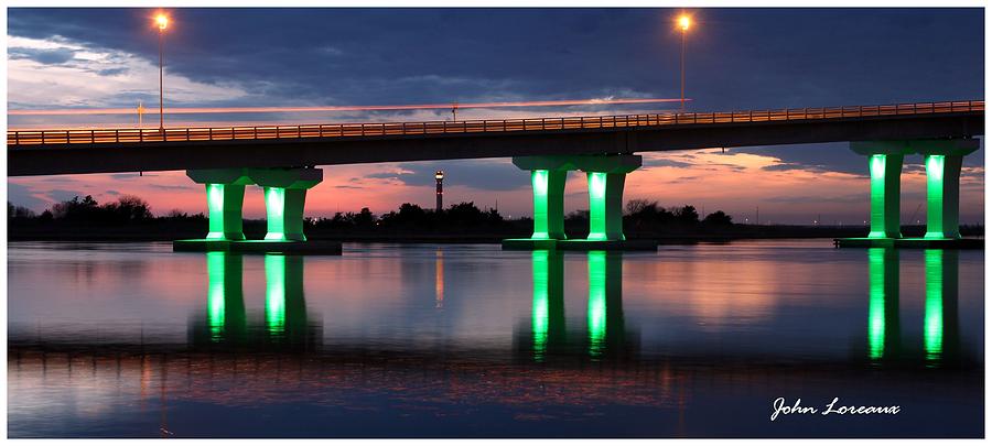 Bridge reflections Photograph by John Loreaux
