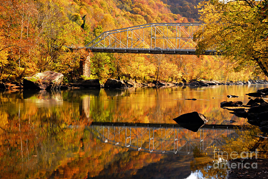 Bridge to Autumn Photograph by Larry Ricker