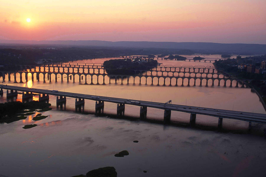 Bridges at sunset on the Susquehanna River. Photograph by Blair Seitz