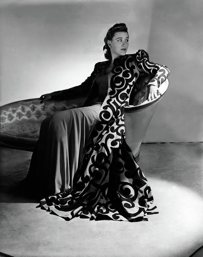 Bridget Bate Tichenor Sitting On A Chaise Lounge Photograph by Horst P. Horst