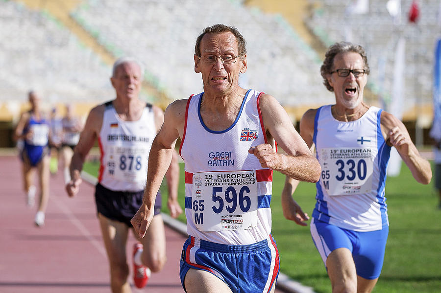 British Masters Athlete Leads The Race Photograph by Alex Rotas