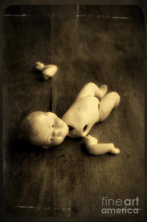 Broken Doll on Wood Photograph by Jill Battaglia