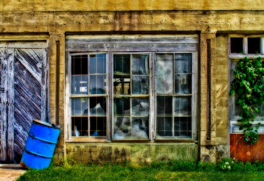 Broken Windows and Blue Barrel Photograph by David and Carol Kelly