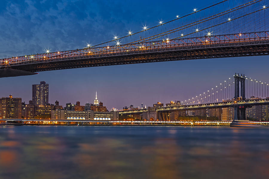 Brooklyn Bridge Frames Manhattan Photograph by Susan Candelario