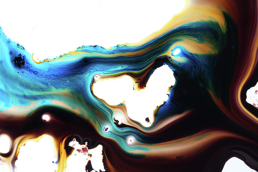 Brown And Blue Dyes In Liquid Photograph by Mimi  Haddon