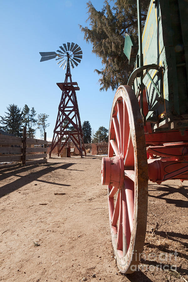 Buckboard and Windmill in Littleton Historic Museum Photograph by Fred Stearns