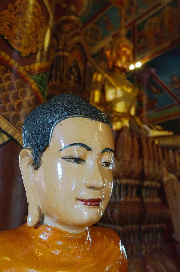 Buddha statue in the Wat Phnom temple in Cambodia Photograph by Niels ...