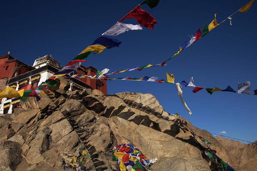 Buddhist Prayer Flags In Windy Blue Sky Photograph by Marji Lang