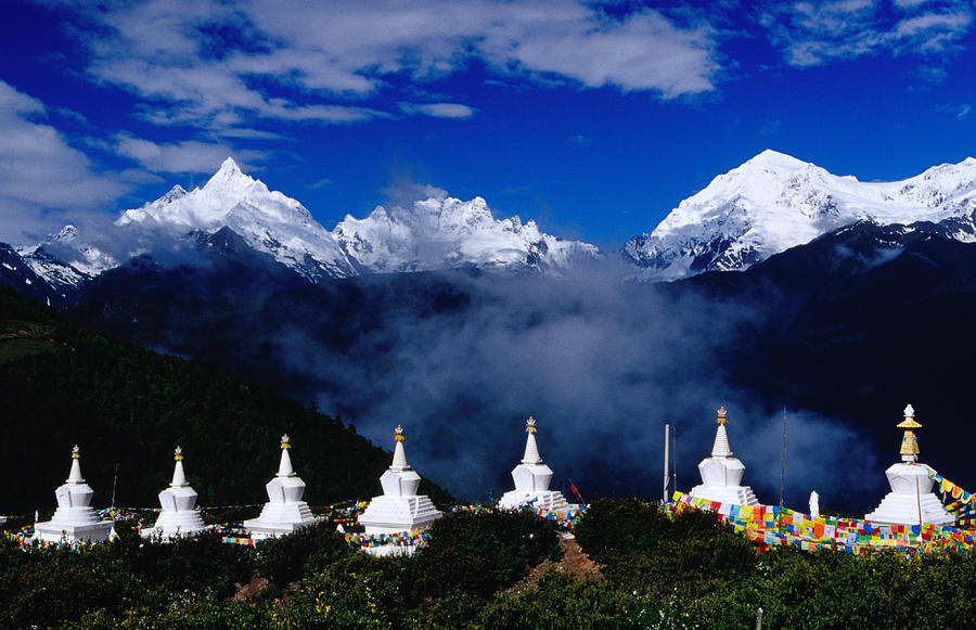 Buddhist Stupas In Front Of Meili Photograph by Richard Ianson