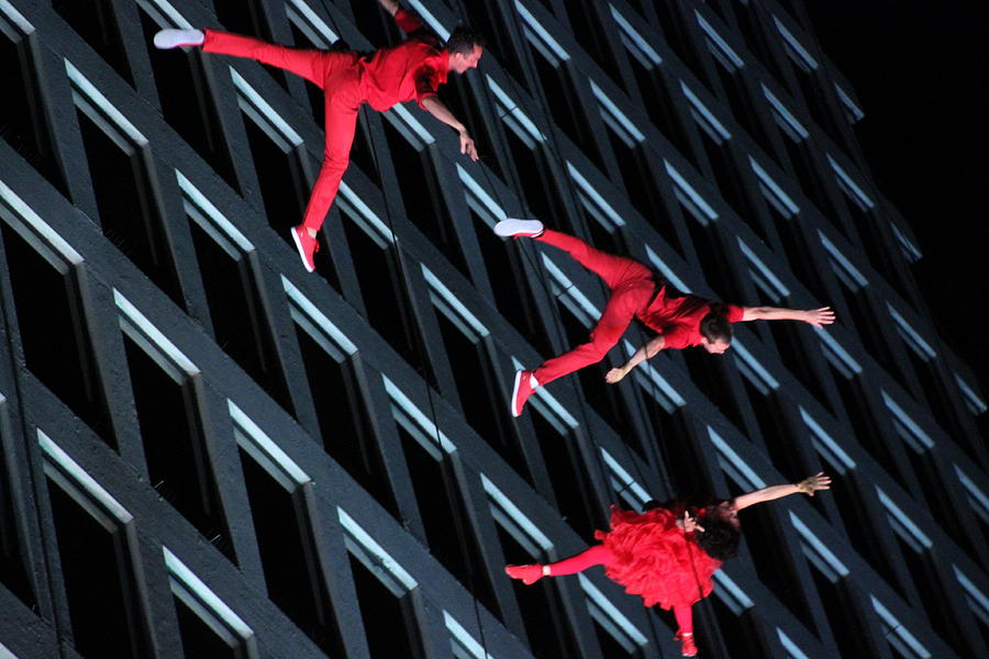 Building Dancers  Photograph by Gerald Salamone