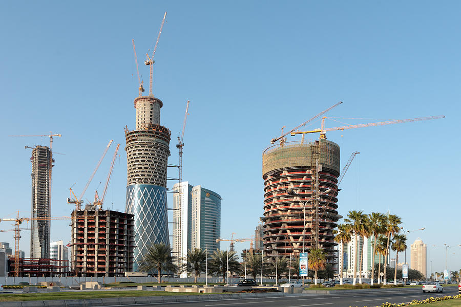 Building Doha tower by tower Photograph by Paul Cowan