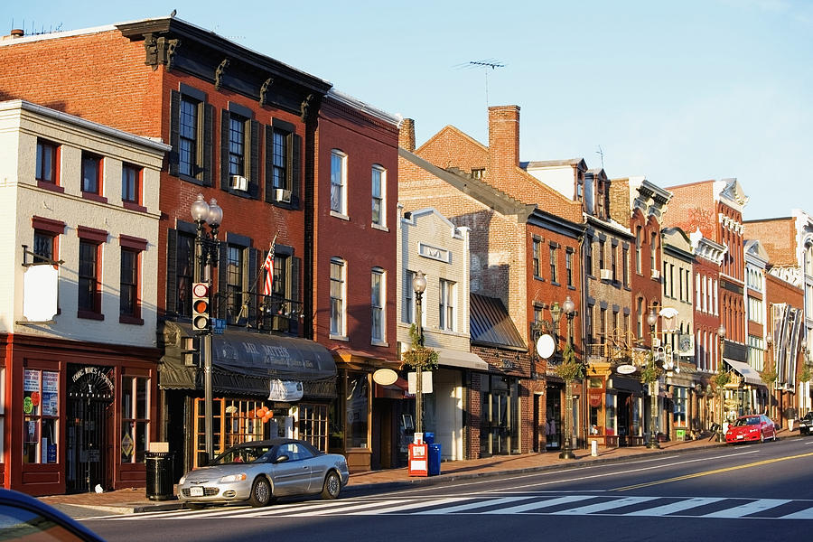 Buildings along a road, M street, Georgetown, Washington DC, USA Photograph by Glowimages