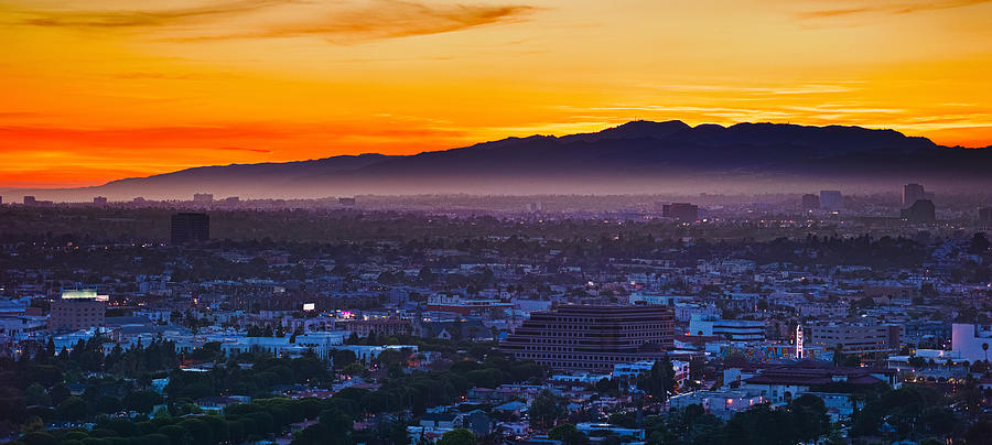 Buildings In A City With Mountain Range Photograph By Panoramic Images 