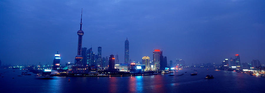 Architecture Photograph - Buildings Lit Up At Dusk, Shanghai by Panoramic Images